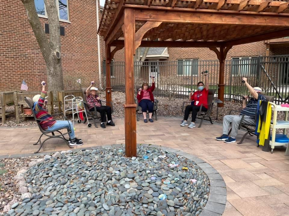 Older adults taking part in an outdoor movement activity
